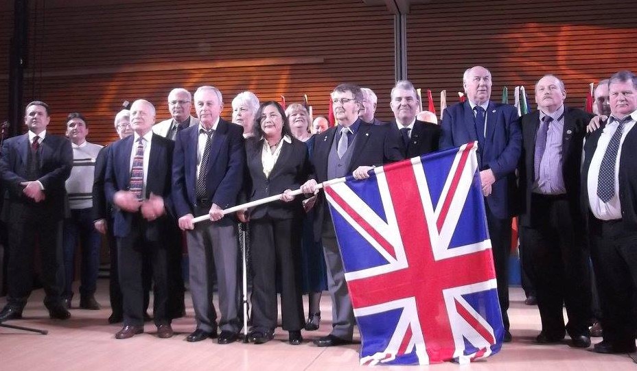 Gala Dinner holding of the Union Jack and for this year Stan and Pornprapa Bolton were given the honour of holding the flag with head conveyor Richard Lumley.